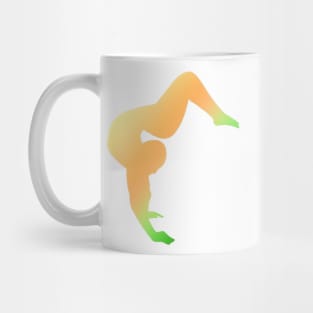 A contortionist in an arched handstand Mug